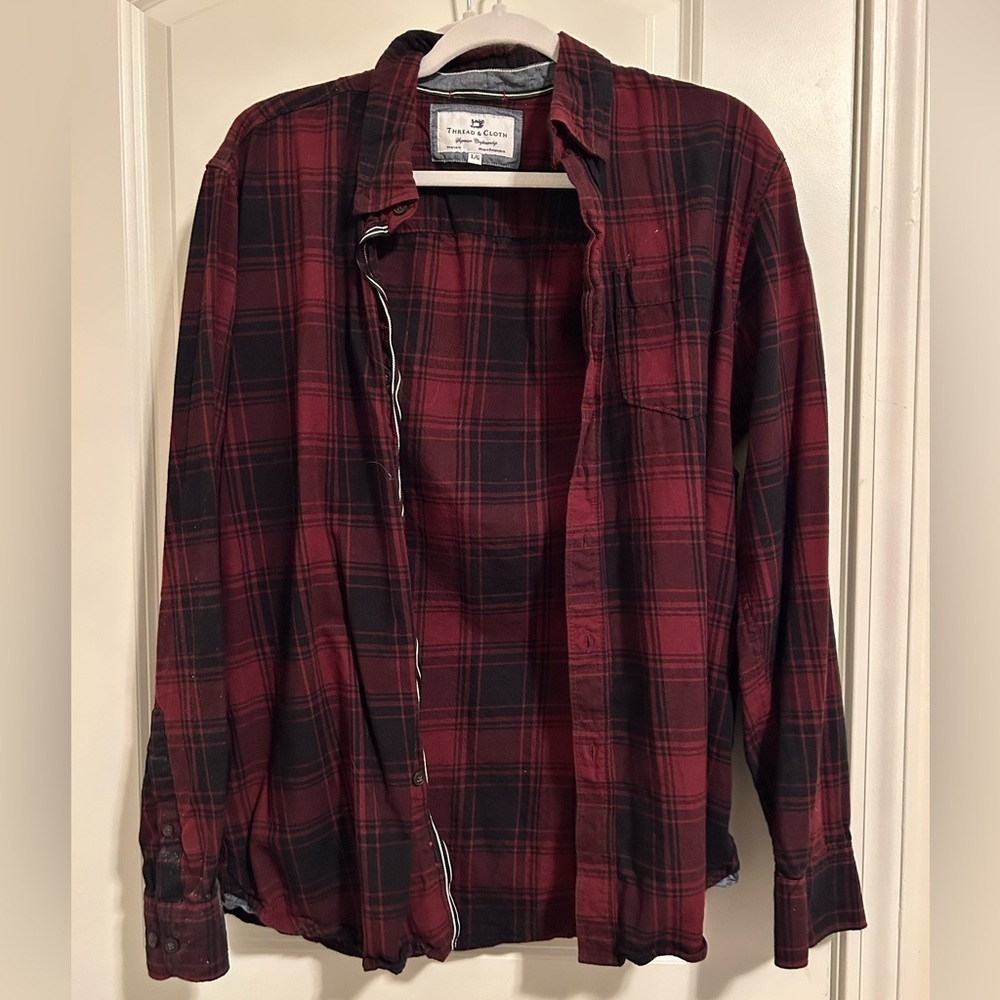 Red and black thread and cloth button down flannel shirt